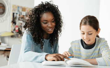tutor helping child with schoolwork